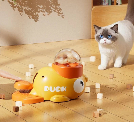 Belinana interactive pet feeder toy shaped like a yellow duck with a cat playing around it